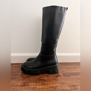 Black tall boots